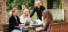 [Translate to English:] Bachelorstuderende arbejder i uniparken